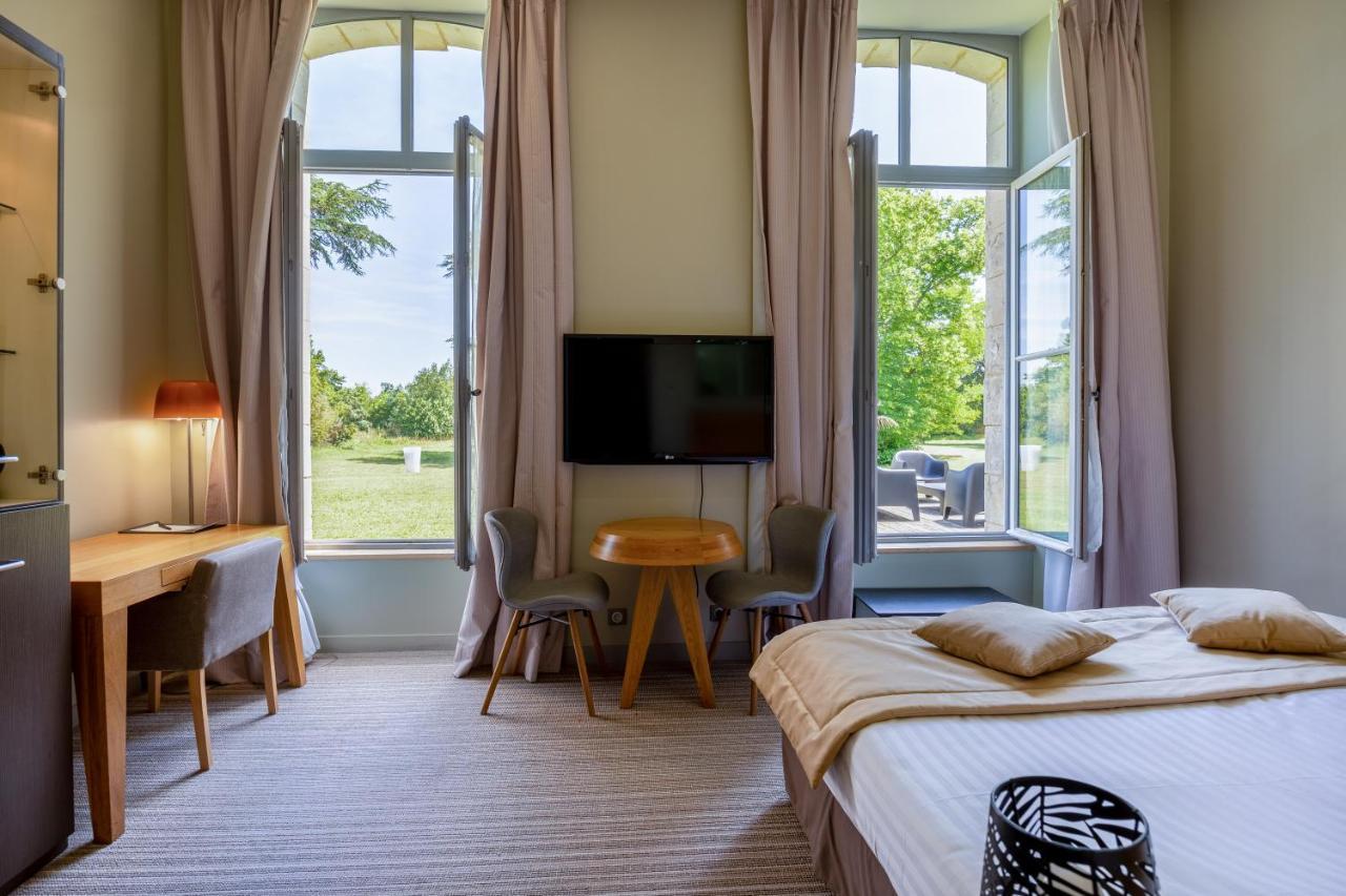Hotel Et Spa Du Chateau Лагор Экстерьер фото