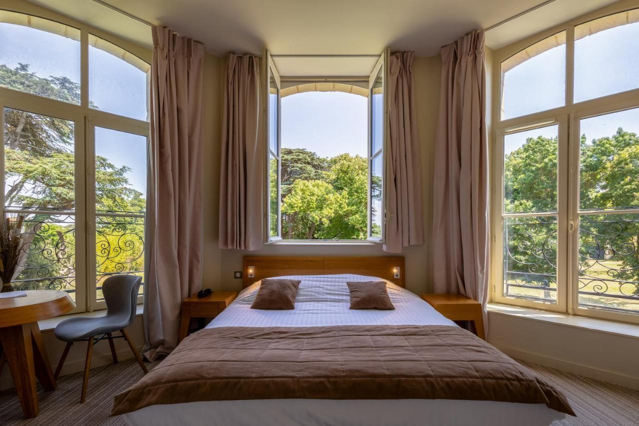 Hotel Et Spa Du Chateau Лагор Экстерьер фото