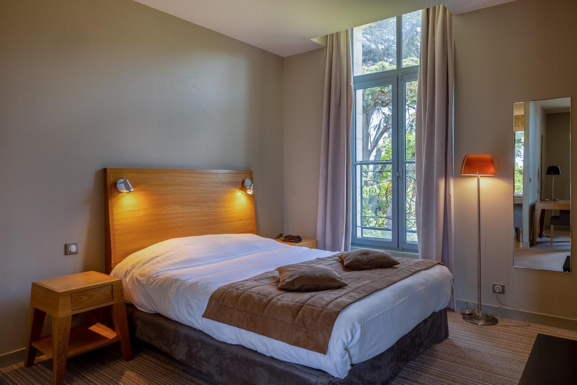 Hotel Et Spa Du Chateau Лагор Номер фото