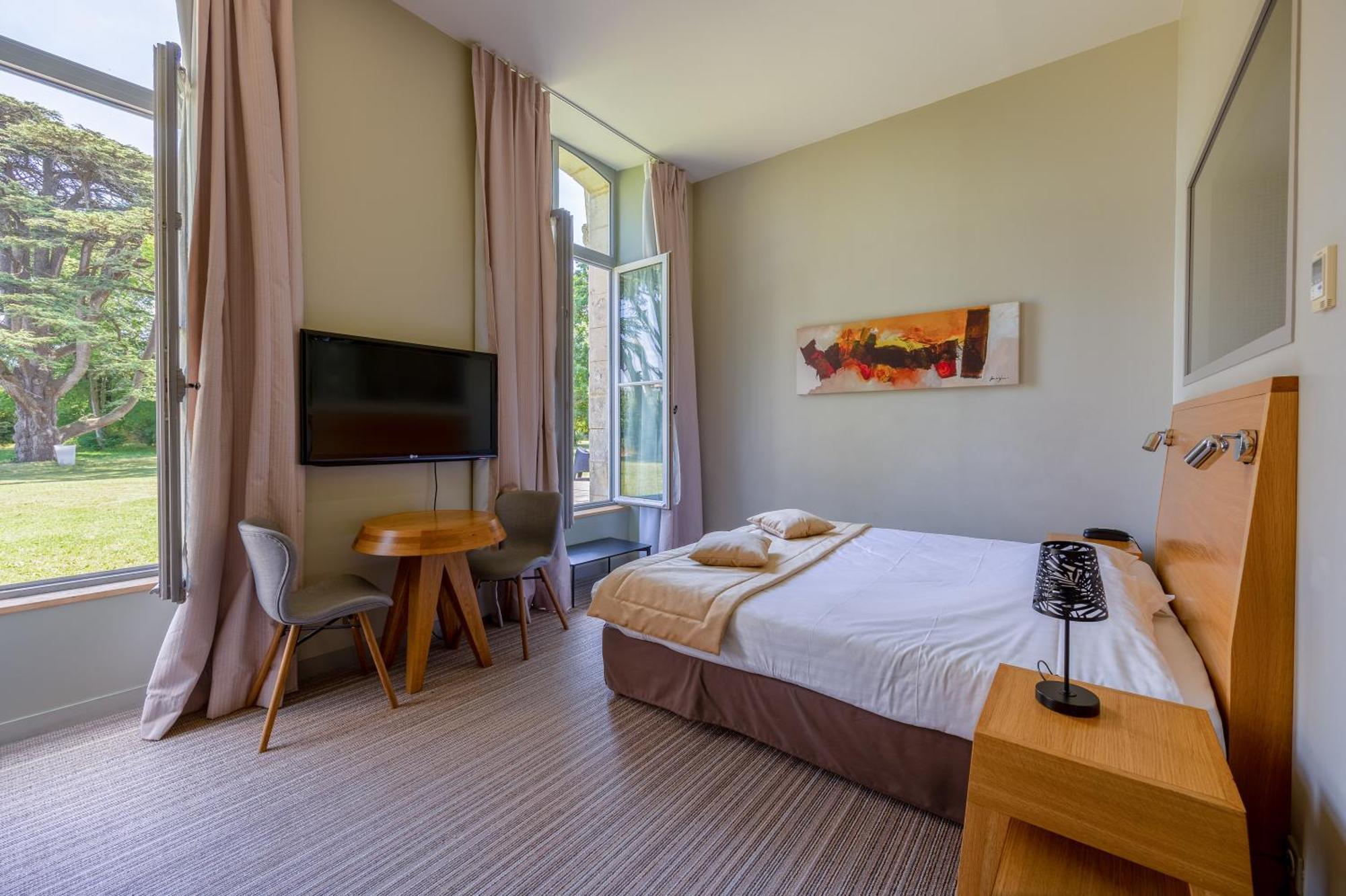 Hotel Et Spa Du Chateau Лагор Номер фото