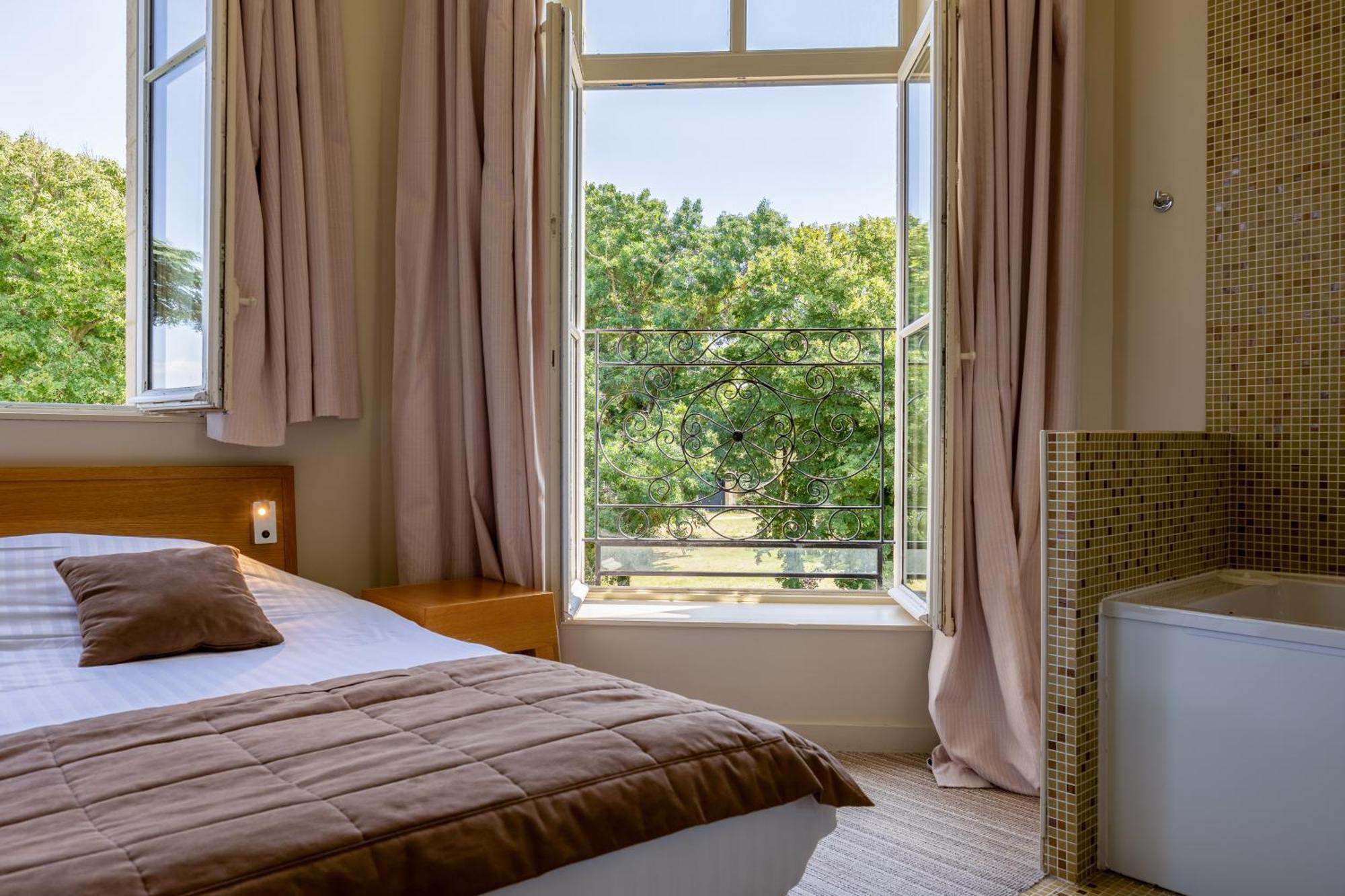 Hotel Et Spa Du Chateau Лагор Номер фото