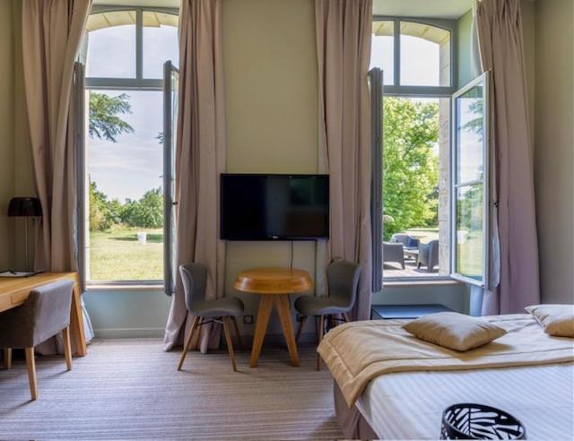 Hotel Et Spa Du Chateau Лагор Экстерьер фото